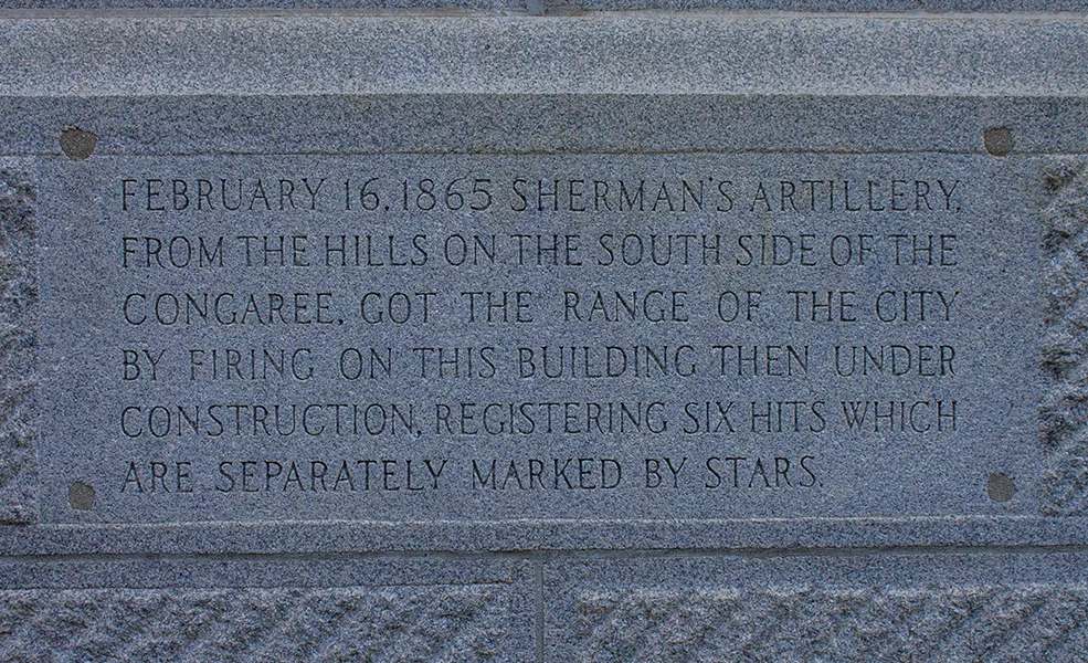 Inscription describing the bronze stars, 2019. Located on the western elevation of the State House, this inscription replaced the original brass plaque.