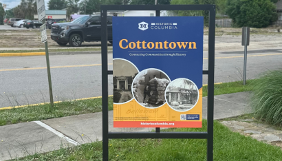 Cottontown sign with street in background