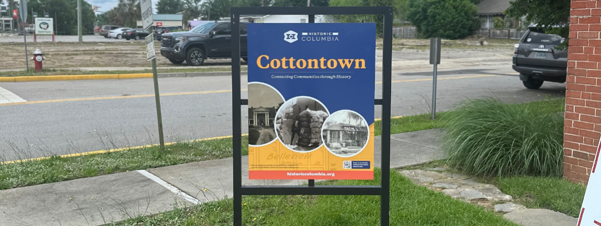 Cottontown sign with street in background